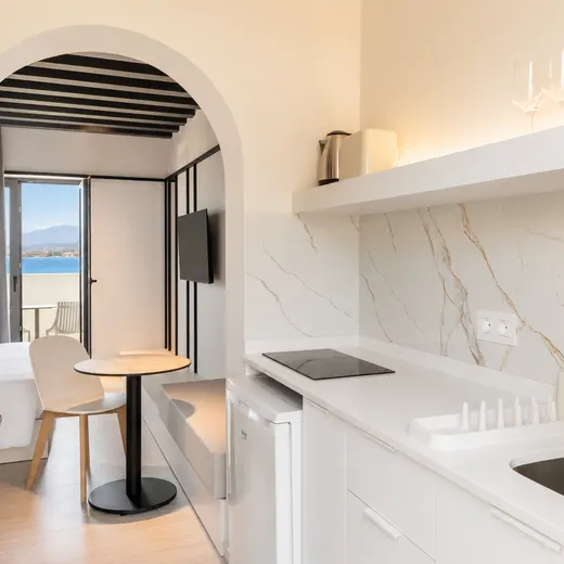 Kitchenette with marble worktop at Veneto Apartments, Stalis