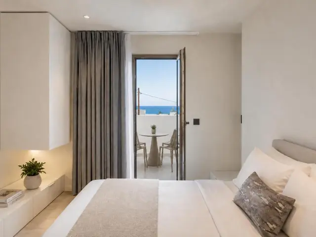 Bedroom with balcony doors to the sea-view balcony