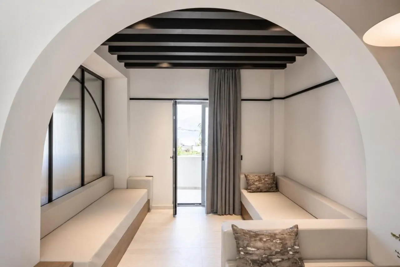 Living room with archway and sofa