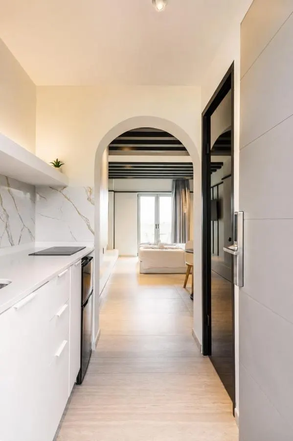 Full kitchenette with marble breakfast bar