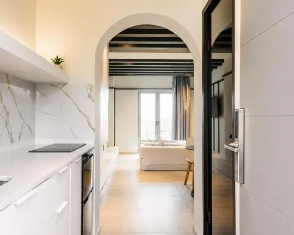 Full kitchenette with marble breakfast bar